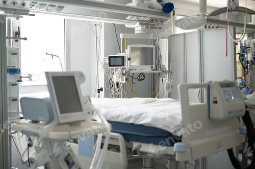Preview: Hospital intensive care unit with medical equipment and bed