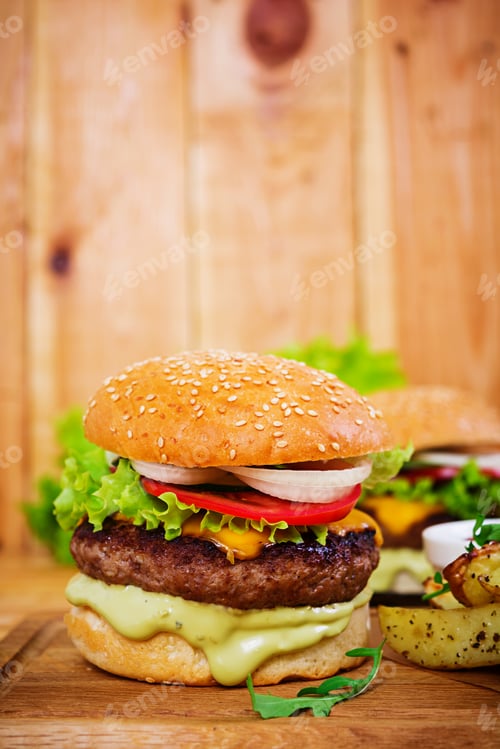 Preview: Delicious handmade burger on wooden background. Close view