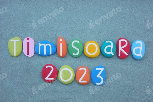 Preview: Timisoara, Roma 2023 European Capital of Culture composed with colored stone letters over green sand