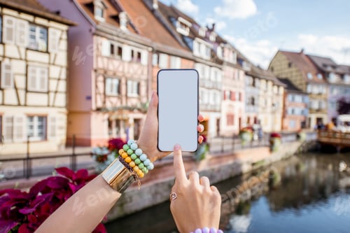Preview: Phone on the Colmar village background in France