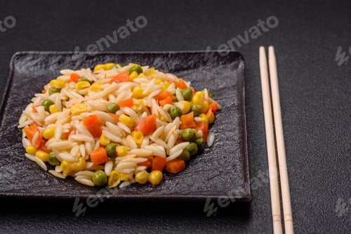Preview: Delicious boiled rice with vegetables corn, carrots, peas with salt