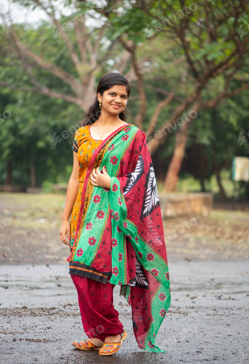 Preview: Happy young beautiful Indian woman at the park outdoor