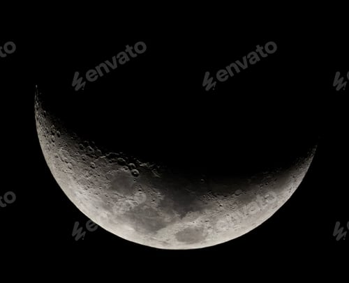 Preview: Gorgeous crescent moon illuminated in gray against a dark night sky
