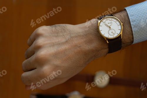 Preview: Elegant Watch on Arm with Patterned Shirt