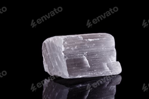 Preview: Macro mineral stone Selenite on black background