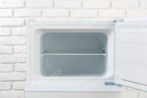 Preview: White Refrigerator Open Against Brick Wall
