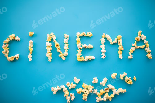 Preview: Food. Frozen Popcorn Corn Popcorn Bucket. Delicious Popcorn on Blue Background. Cinema.