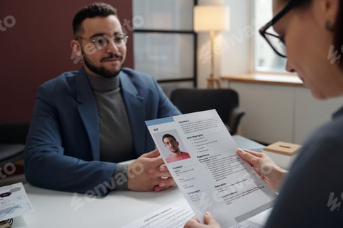 Preview: Recruiter Holding CV During Job Interview