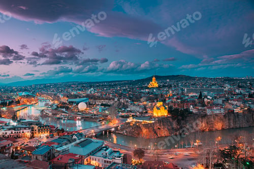 Preview: Tbilisi, Georgia. Top View Of Famous Landmarks In spring sunset Evening. Georgian Capital Skyline