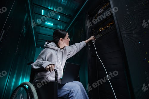 Preview: Woman in Wheelchair Managing Servers