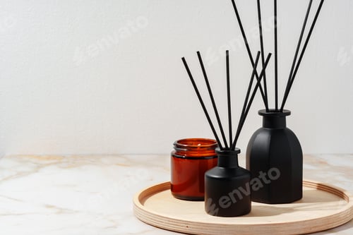 Preview: Black Reed Diffuser and Amber Candle on Wooden Tray