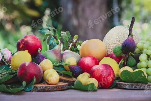 Preview: variety of fruit on wooden table - concept of freshness and naturalness