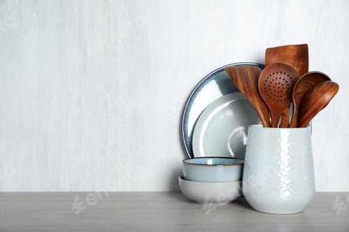 Preview: Set of kitchen utensils on light table, space for text