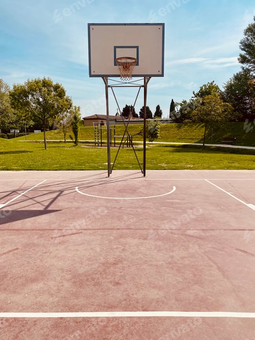 Preview: Empty basketball playground.
