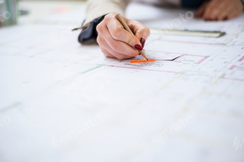 Preview: Close-up of architect working on construction plan