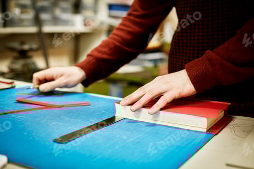 Preview: A man restoring and binding a book