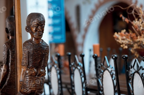 Preview: Closeup shot of wooden sculpting with a blurred background