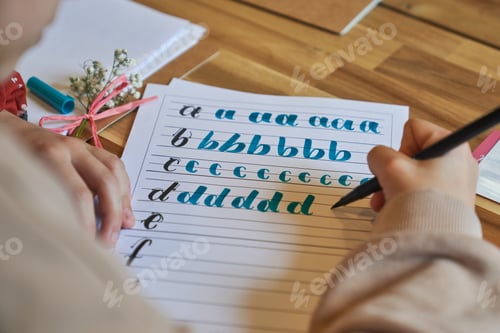 Preview: Crop person drawing letters on paper sheet