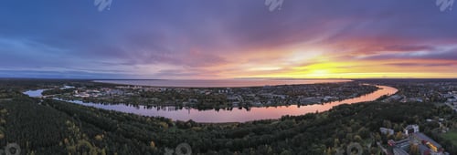 Preview: Aerail panorama of the coastal town with the beautiful sunset background