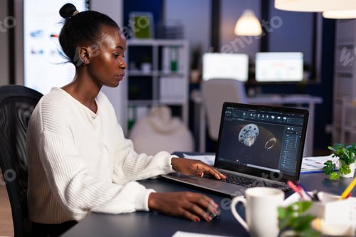 Preview: African woman engineer working at new project doing overtime