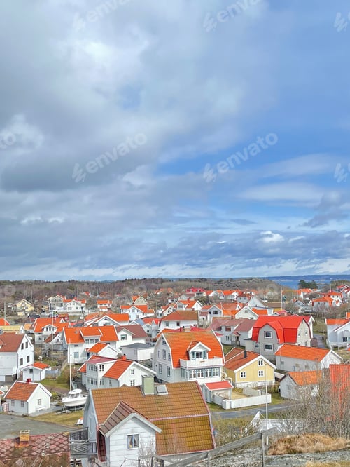 Preview: A view of red wooden houses on Vrango Archipelago island .