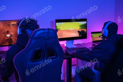 Preview: Two young streamers and gamers playing video games together to explain it over the internet.