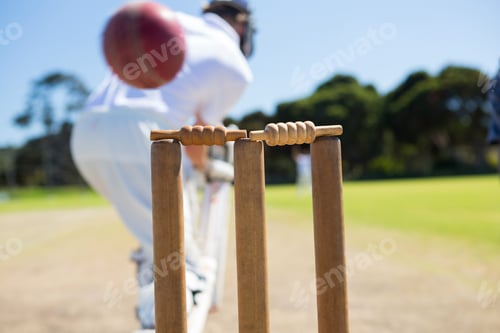 Preview: Close up of ball by stump against batsman