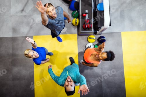 Preview: Fitness, sport, training, gym, success concept. Group of happy people in the gym celebrating victory
