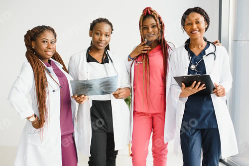 Preview: group of african american doctor and nurse in hospital ward.