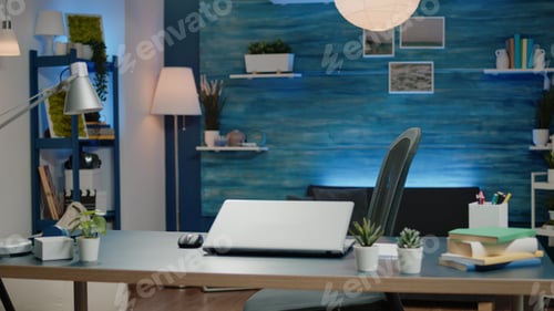 Preview: Young entrepreneur using laptop for remote online business work