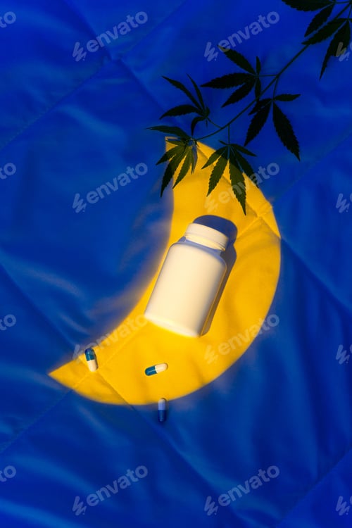 Preview: Products for sleep, from insomnia with CBD on blanket in light of moon