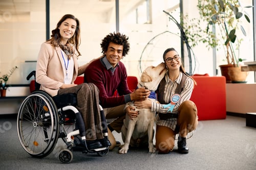 Preview: Group of diverse business colleagues with assistance dog in the office.
