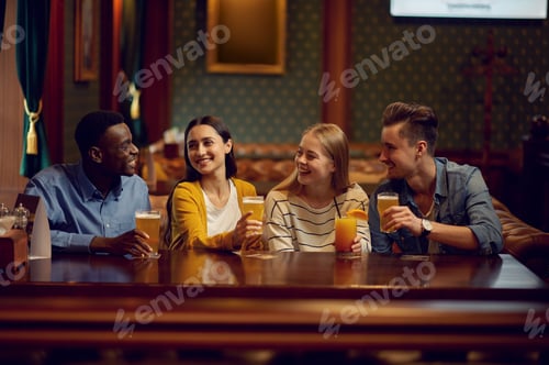 Preview: Four friends drinks alcohol at the counter in bar