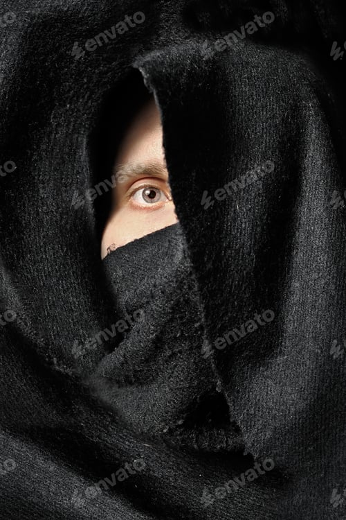 Preview: Eye Of Male Looking From Black Fabric
