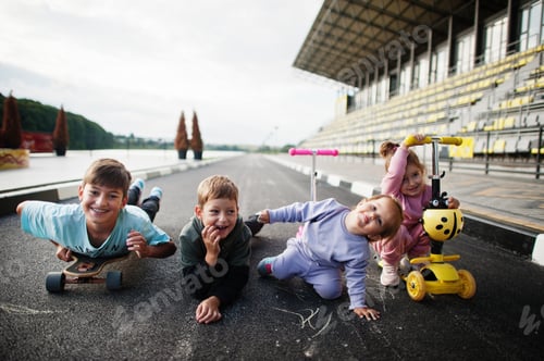 Preview: Four kids in asphalt play and having fun
