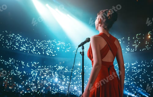 Preview: A singer on stage with a microphone