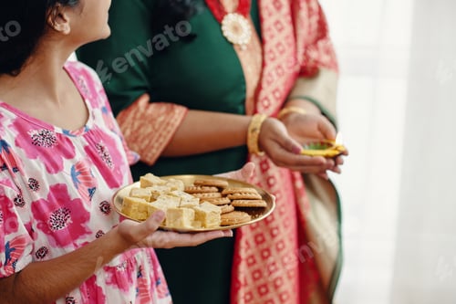 Preview: Sharing Indian Snacks During Cultural Gathering