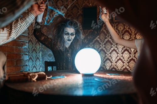 Preview: Witch over a crystal ball, young people on seance