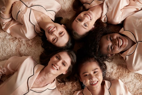 Preview: Smiling Women Lying on Floor