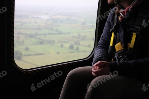 Preview: Woman Riding in a helicopter
