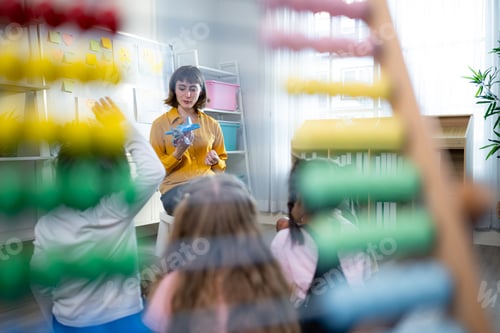 Vista previa: Teacher and students, Learn and study about airplanes in a classroom of school
