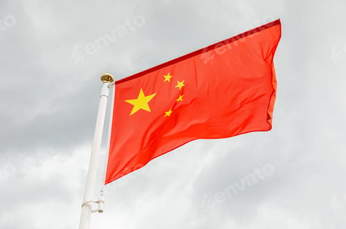 Preview: flag of China against white sky with clouds