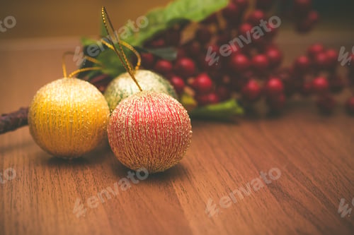 Preview: Christmas decoration balls with cranberries on wooden table