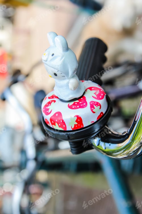 Preview: Detail of bike bell toy parked in the street