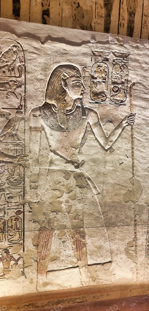 Preview: Ancient Egyptian artwork adorns an old building, showcasing captivating symbols and figures