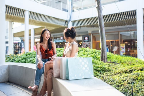 Preview: Asian beautiful two women shopping goods outdoor in department store.