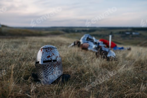 Preview: Helmet in blood, dead knight on background