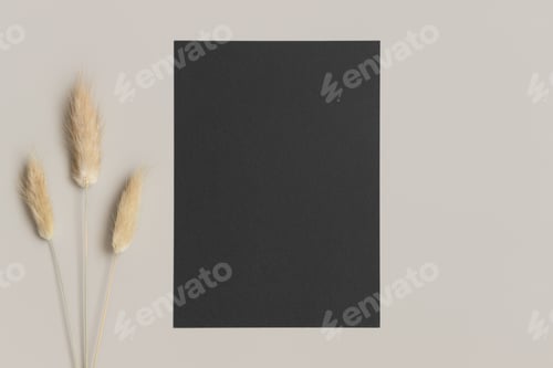 Preview: Black invitation card mockup with a lagurus on a beige table. 5x7 ratio, similar to A6, A5.