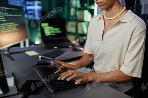 Preview: Hands of Female IT Programmer Typing on Computer Keyboard at Desk Working in Office