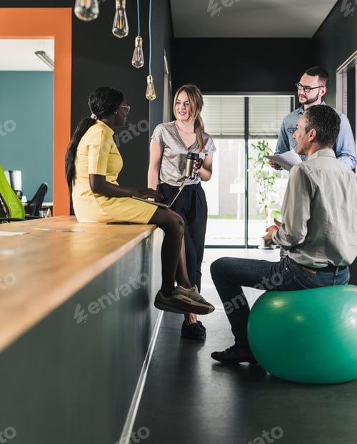 Preview: Business people having an informal meeting in office